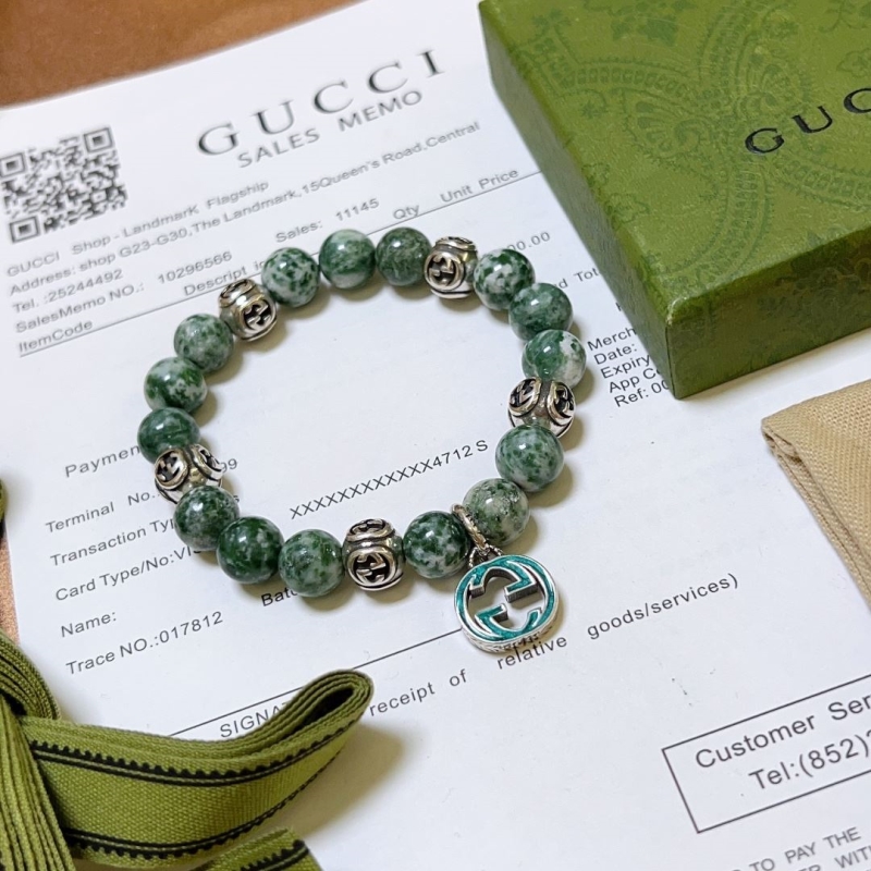 G*u*i bracelets
